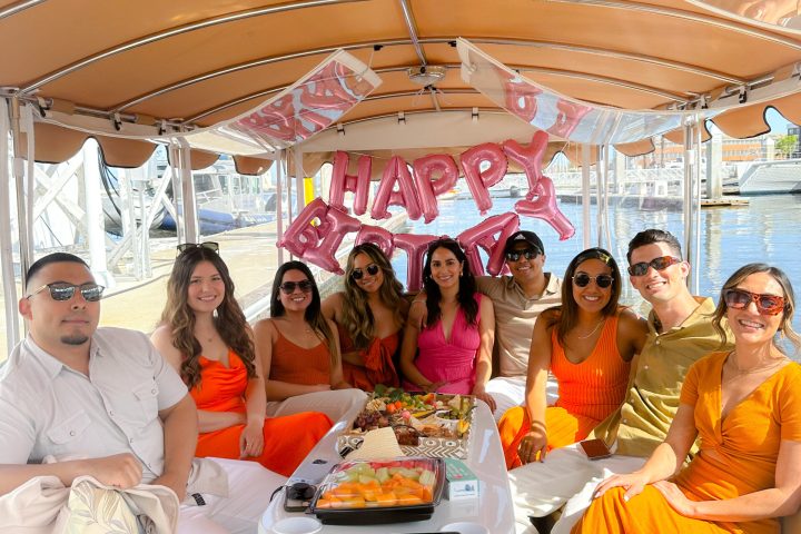 a group of people sitting at a table