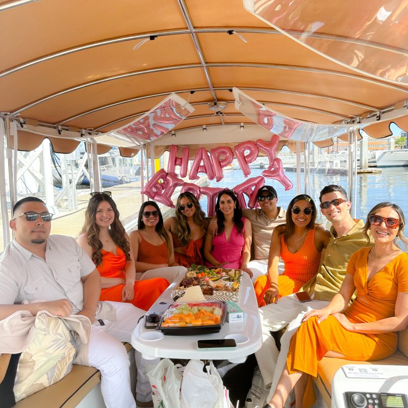 a group of people sitting at a table