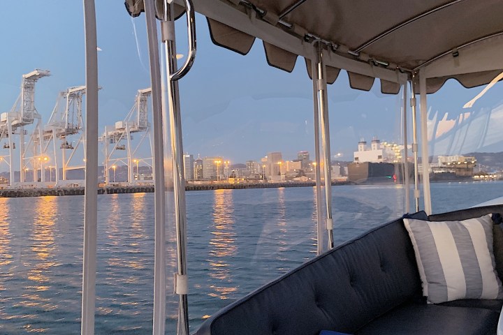 a chair sitting in front of a body of water