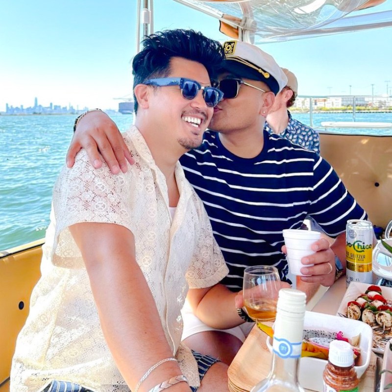 a woman sitting at a table eating food