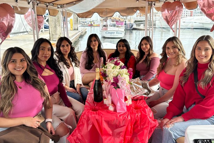 a group of people sitting posing for the camera