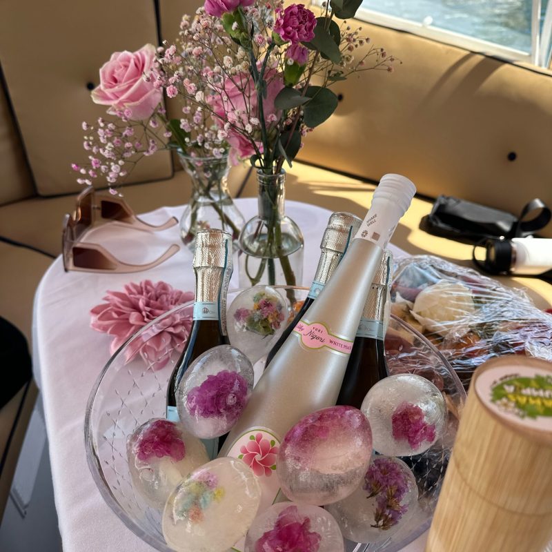 a vase filled with pink flowers on a table