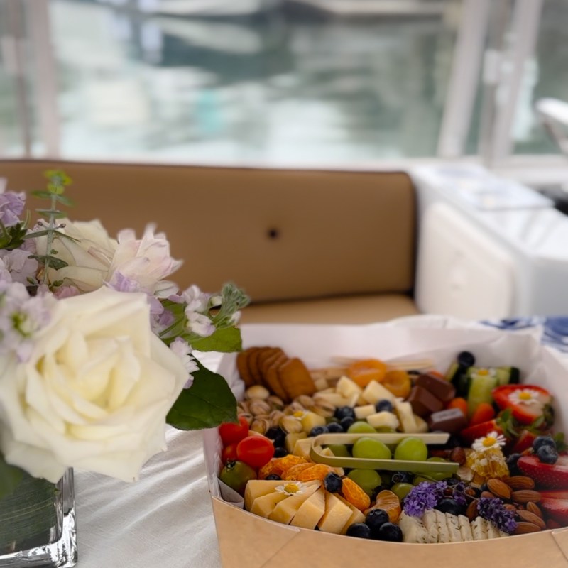a box filled with different types of food on a table