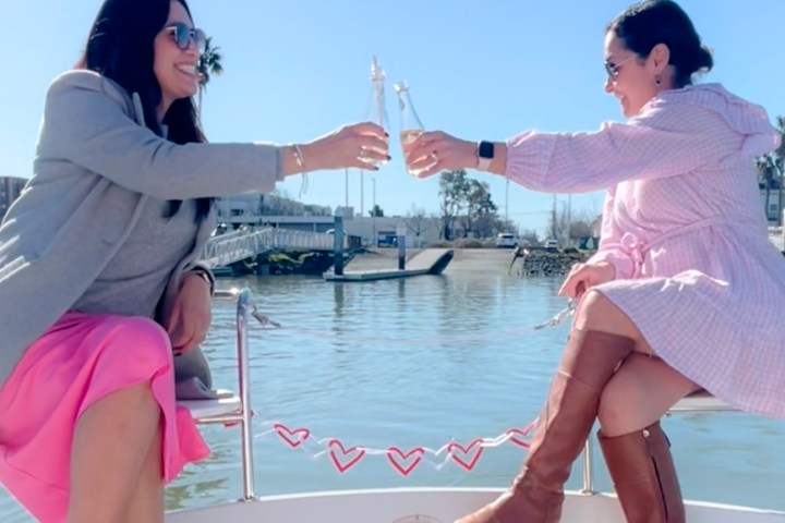 a woman sitting on a table