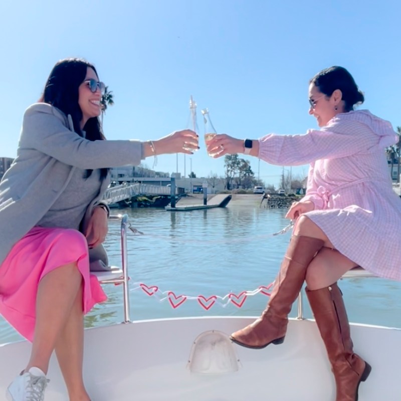a woman sitting on a table